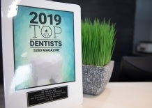 5280 Magazine 2019 Top Dentists sign in Longmont dental office