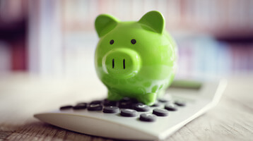 piggy bank on a calculator