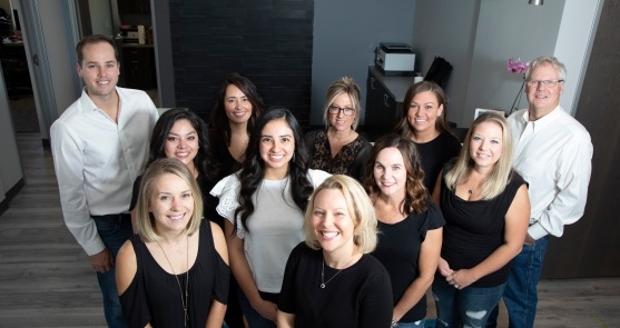 The Longmont Complete Dentistry team smiling in Longmont dental office