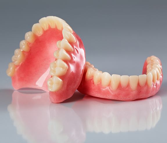 Full set of upper and lower dentures