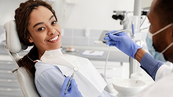 Young woman smiling before dental treatment