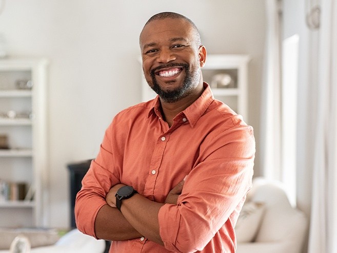 Man with healthy smile after root canal therapy