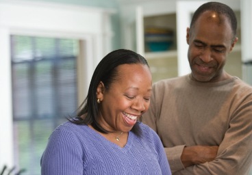 Woman smiling after restorative dentistry