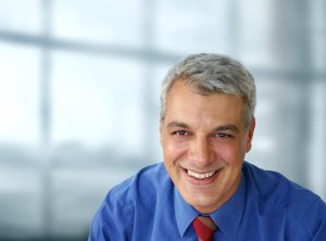 professional man smiling in the office