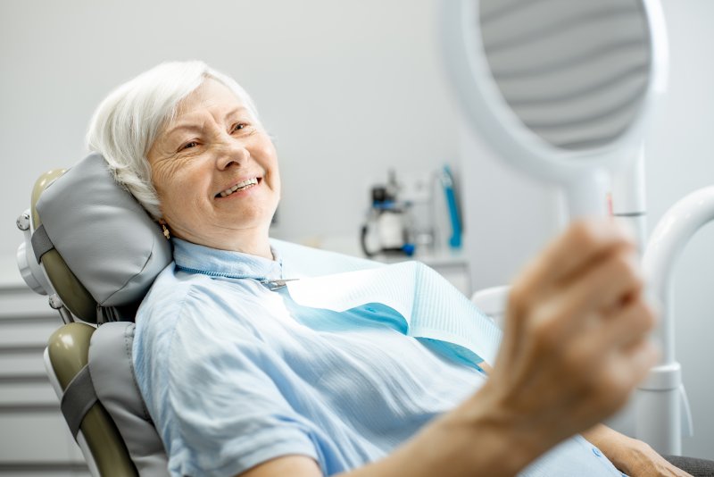 an older woman in the dentist chair