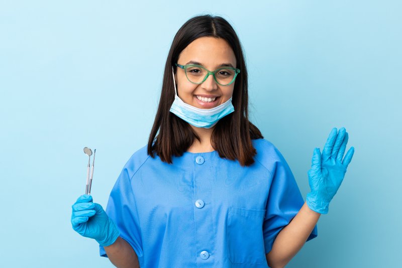 Longmont dentist waving