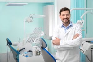 dentist standing by chair