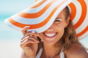 Smiling woman with white teeth thanks to Longmont dentist 