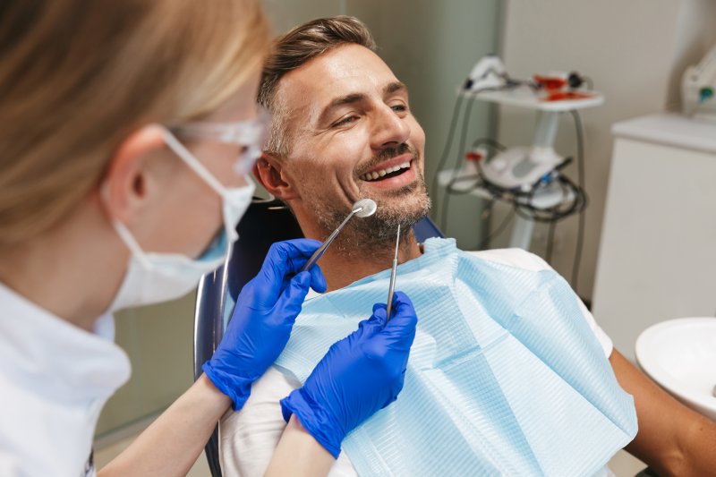 patient smiling in dental chair