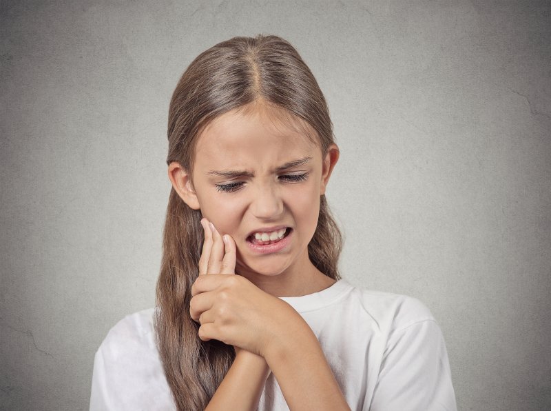 Girl with toothache